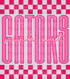 Graphic design featuring the word “GATORS” in tall, bold pink outlined letters with a lighter pink fill. The phrase “pink out” is written in a bright cursive script across the center. The background includes a hot pink and light pink checkerboard pattern on the top and bottom, creating a bold and spirited “Pink Out” theme.